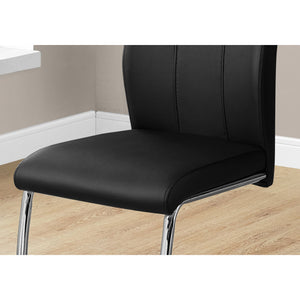 Two 77.5" Black Leather Look Chrome Metal and Foam Dining Chairs